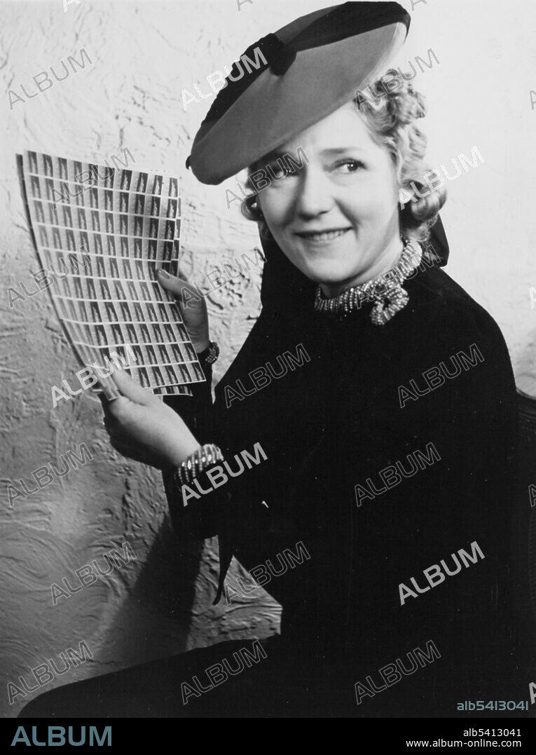 Actress Mary Pickford, a strong supporter of women's rights, buying the first sheet of Equal Rights seals, 1938. Photographed by Louise Pote, College Park, Maryland. Mary Pickford (born Gladys Louise Smith; 1892-1979) was a Canadian-born American film actress and producer. With a career spanning 50 years, she was a co-founder of both the Pickford-Fairbanks Studio (along with Douglas Fairbanks) and, later, the United Artists film studio (with Fairbanks, Charlie Chaplin and D. W. Griffith), and one of the original 36 founders of the Academy of Motion Picture Arts and Sciences who present the yearly "Oscar" award ceremony. One of the earliest stars to be billed under her own name, she was one of the most popular actresses of the 1910s and 1920s, and was known as "America's Sweetheart.".