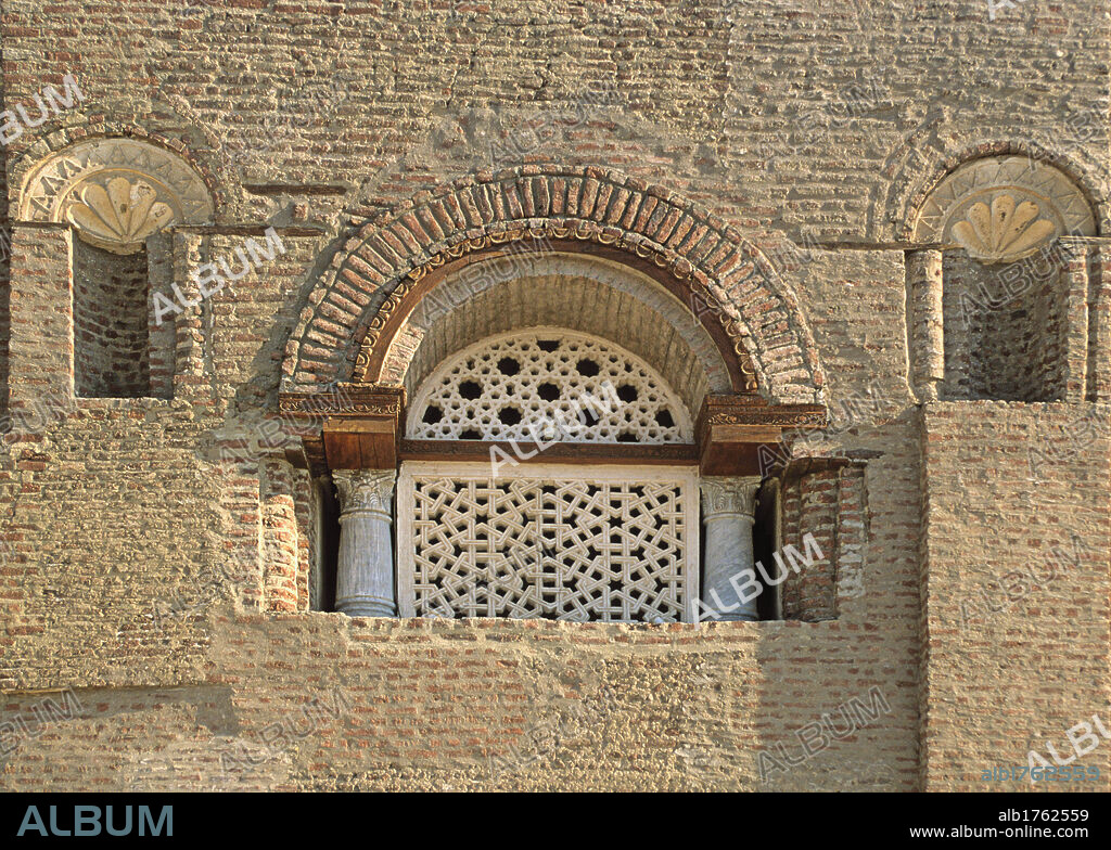 Mosque of Amr Ibn al As, by Unknown Artist, 9th Century,. Egypt, El Cairo, Cairo, Cairo, Mosque of Amr Ibn al-As. Detail window with archivolt small columns intrados arched lintel fretwork geometric designs patterns stars arabesque two side niches 2009 photograph.