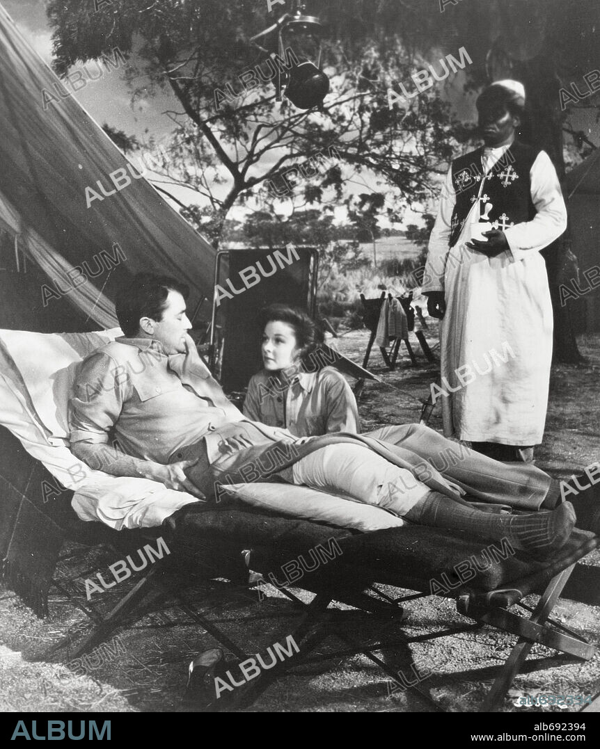 GREGORY PECK and SUSAN HAYWARD in THE SNOWS OF KILIMANJARO, 1952, directed by HENRY KING. Copyright 20TH CENTURY FOX.