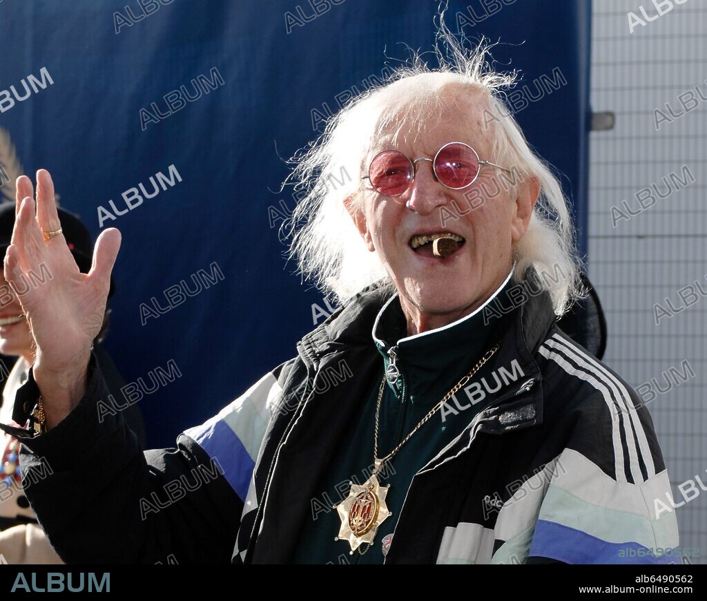 Sir Jimmy Savile attends the nameing of the 92,000 tonne Queen Elizabeth for the Cunard Line at a ceremony in Southampton on Monday 11th October 2010. Her Majesty named the liner and was then given a tour of the new liner starting with a visit to the Bridge before proceeding to The QueenÕs Room to view a portrait commissioned by Cunard of Her Majesty. The Queen Elizabeth will set sail on her maiden voyage to the Canary Islands the following day, 12th October 2010. 12/10/2010