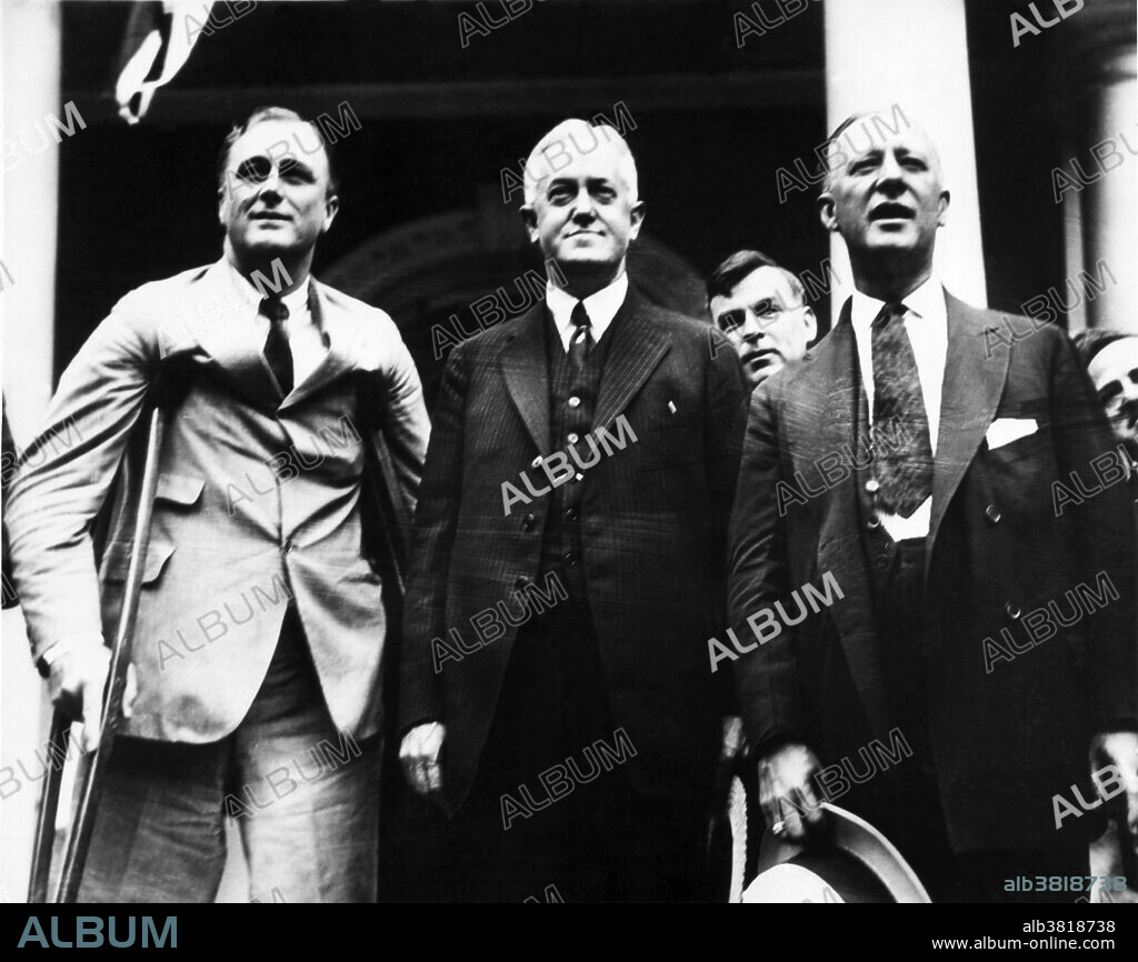 Franklin Delano Roosevelt (1882-1945), the thirty-second President of the United States, with politicians John William Davis (1873-1955) and Alfred Emanuel Smith (1873-1944), at his home in Hyde Park, NY. Photograph taken August 7, 1924.