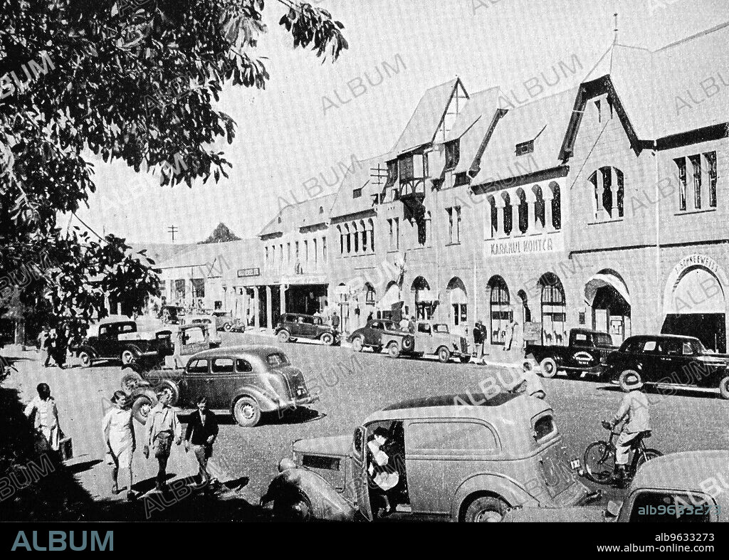 Traffic in the Kaiser Street of Windhoek, 1935, German Southwest, Colony, Namibia, Historic, digitally restored reproduction of an original artwork from the early 20th century, exact original date not known.