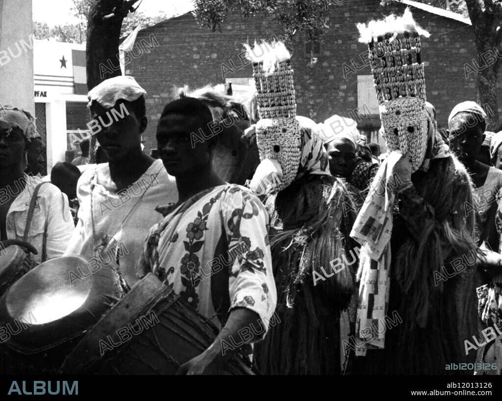 Bamako, Mali. Popular Orchestra with masked men.