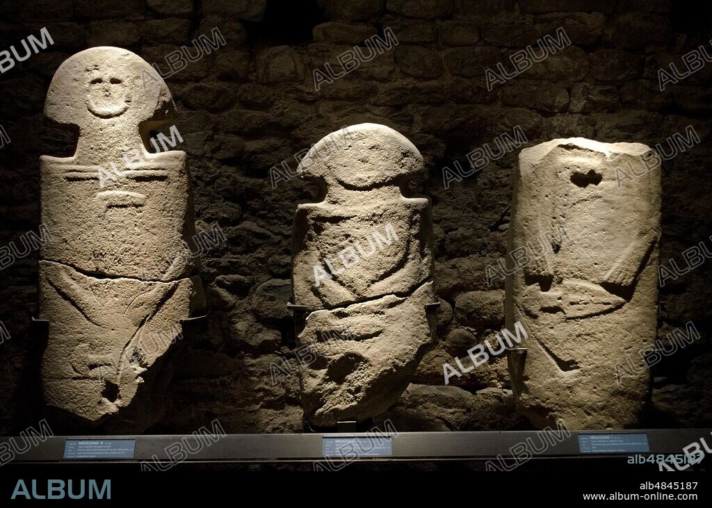 PREHISTORY Minucciano III, Minucciano II and Minucciano I, statues of male stele of the Eneolithic age with dagger and ax found in Minucciano (LU). This type of anthropomorphic monument in sandstone is part of the phenomenon of megalithism, common to the pre / protohistoric populations of Europe between the fourth and first millennium BC - Italy, Copper Age.