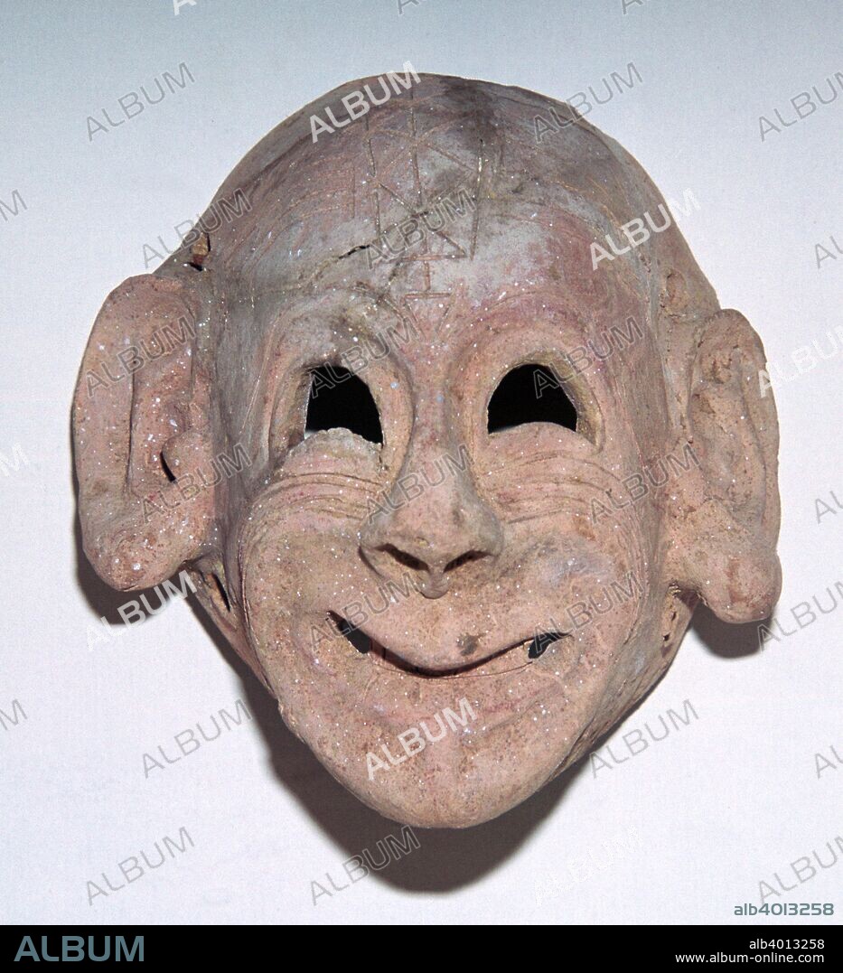 Carthaginian grinning mask made of baked clay, now in the Bardo Museum in Tunis, 6th century.