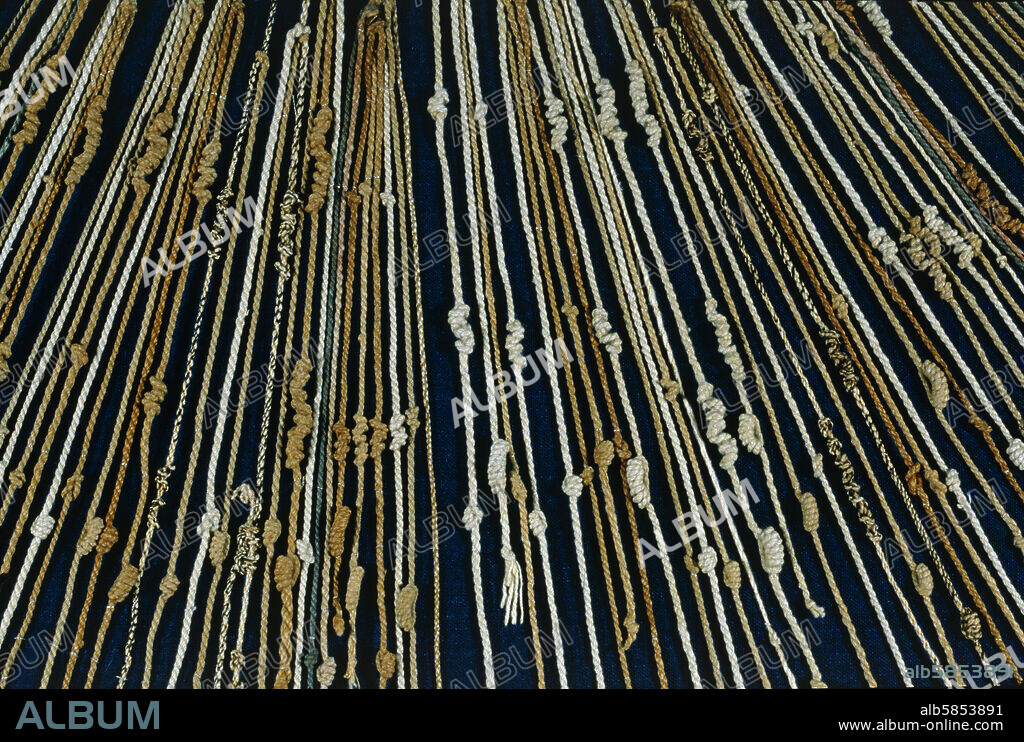 Quipu or khipu-A system of knotted cords used by the Incas and its predecessor societies in the Andean region to store massive amounts of information important to their culture and civilization. Inca culture; Peru; 15th-16th century CE.
