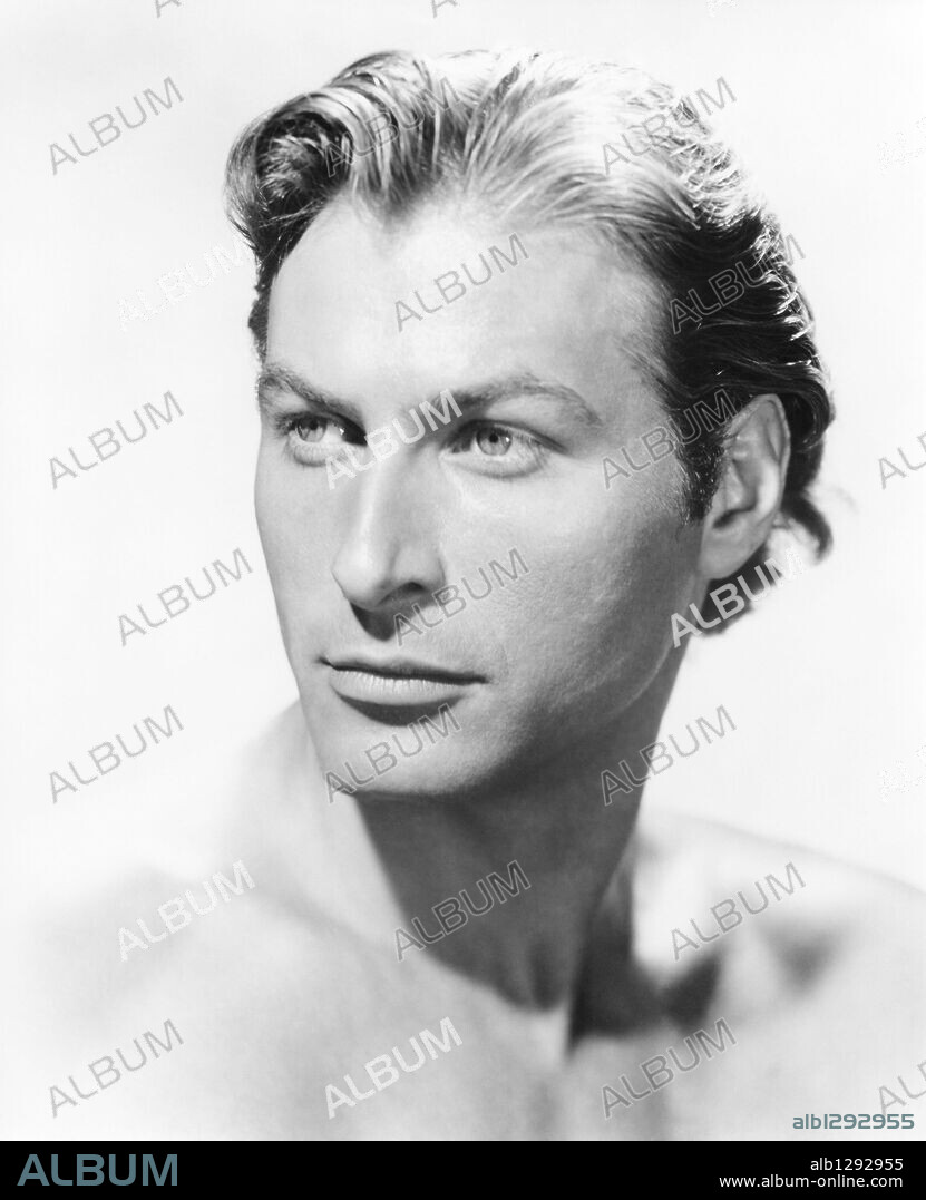 LEX BARKER in TARZAN'S MAGIC FOUNTAIN, 1949, directed by LEE SCHOLEM. Copyright RKO.