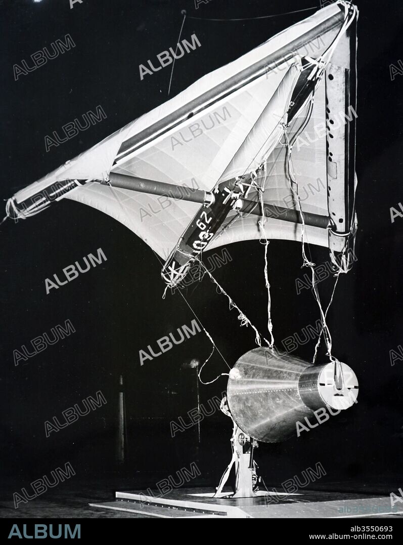 Photograph of a half scale model of the Gemini 1 space capsule. Gemini 1 was the first unmanned test flight of the Gemini spacecraft in NASA's Gemini program. Dated 20th century.