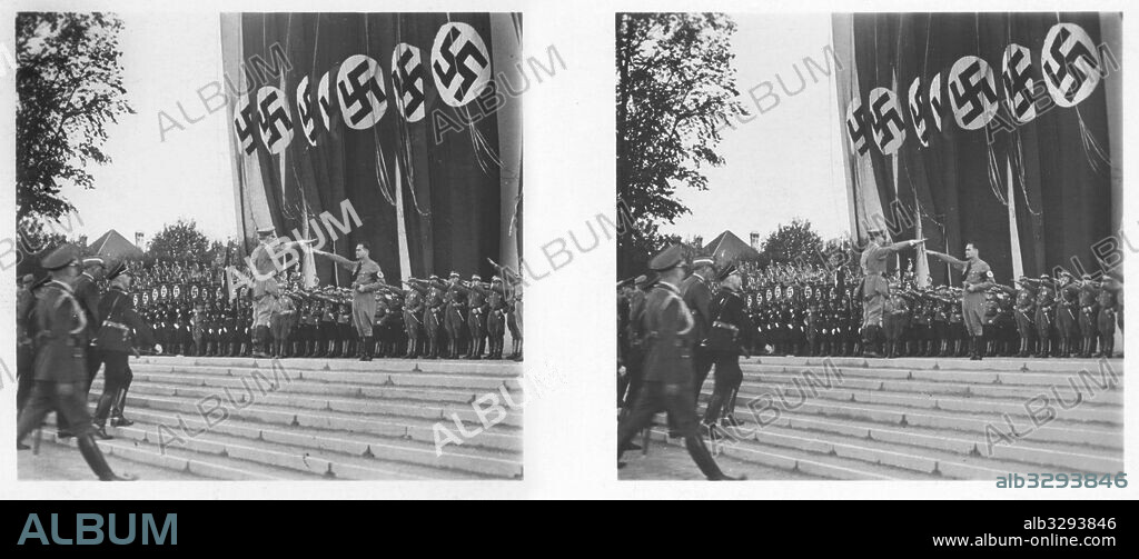 Rudolf Hess greets Adolf Hitler at the 1936 Nuremberg Rally of Honour.