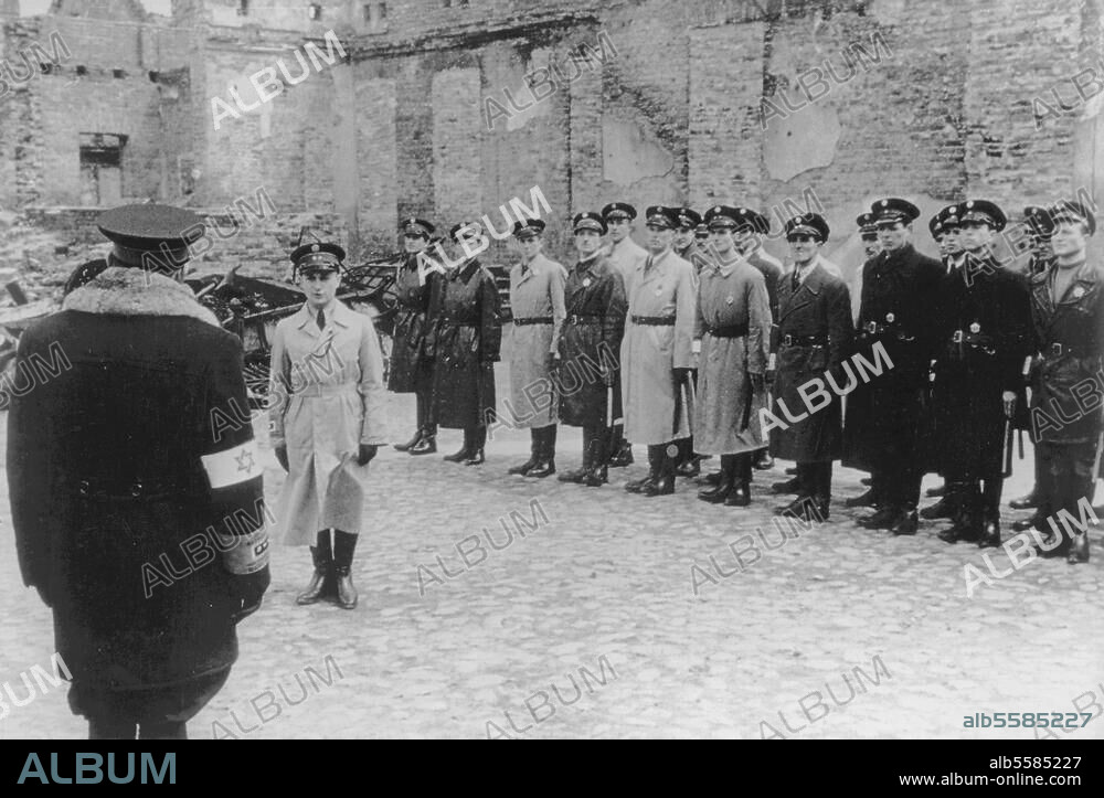 World War II / Warsaw Ghetto. (established 1940 by German occupying forces for ghettoisation and deportation of Jews; destroyed after the uprising in 1943). Jewish Ghetto Police lined up for roll call. PK photo (J.Knobloch), summer 1941.