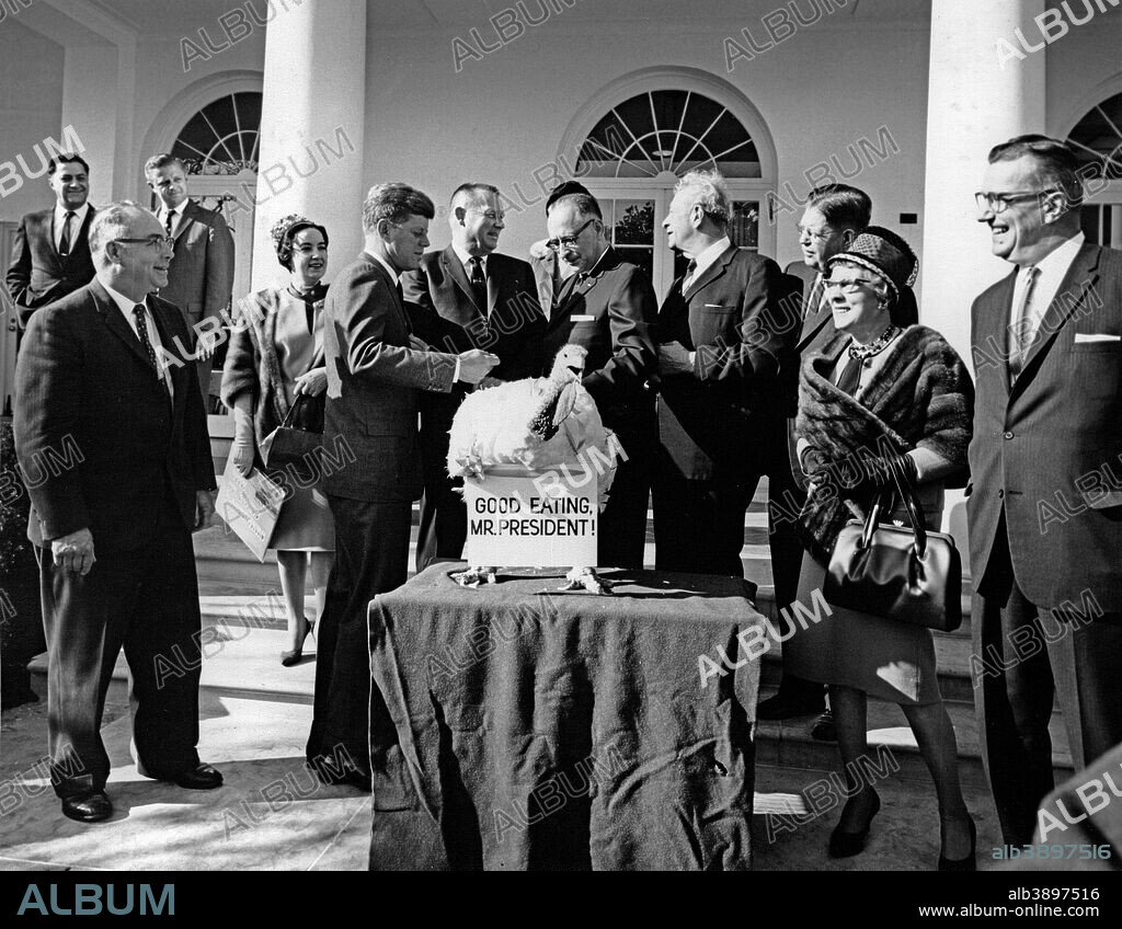 November 19, 1963 - President John F. Kennedy receives a Thanksgiving turkey from the Poultry and Egg National Board, accompanied by Senator Everett M. Dirkson.