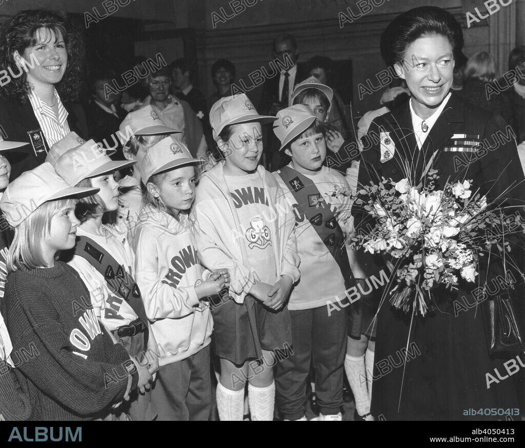 Princess Margaret (1930-2002) with Brownies, c1990. A new Brownie uniform designed by Jeff Banks (born 1943) is launched.