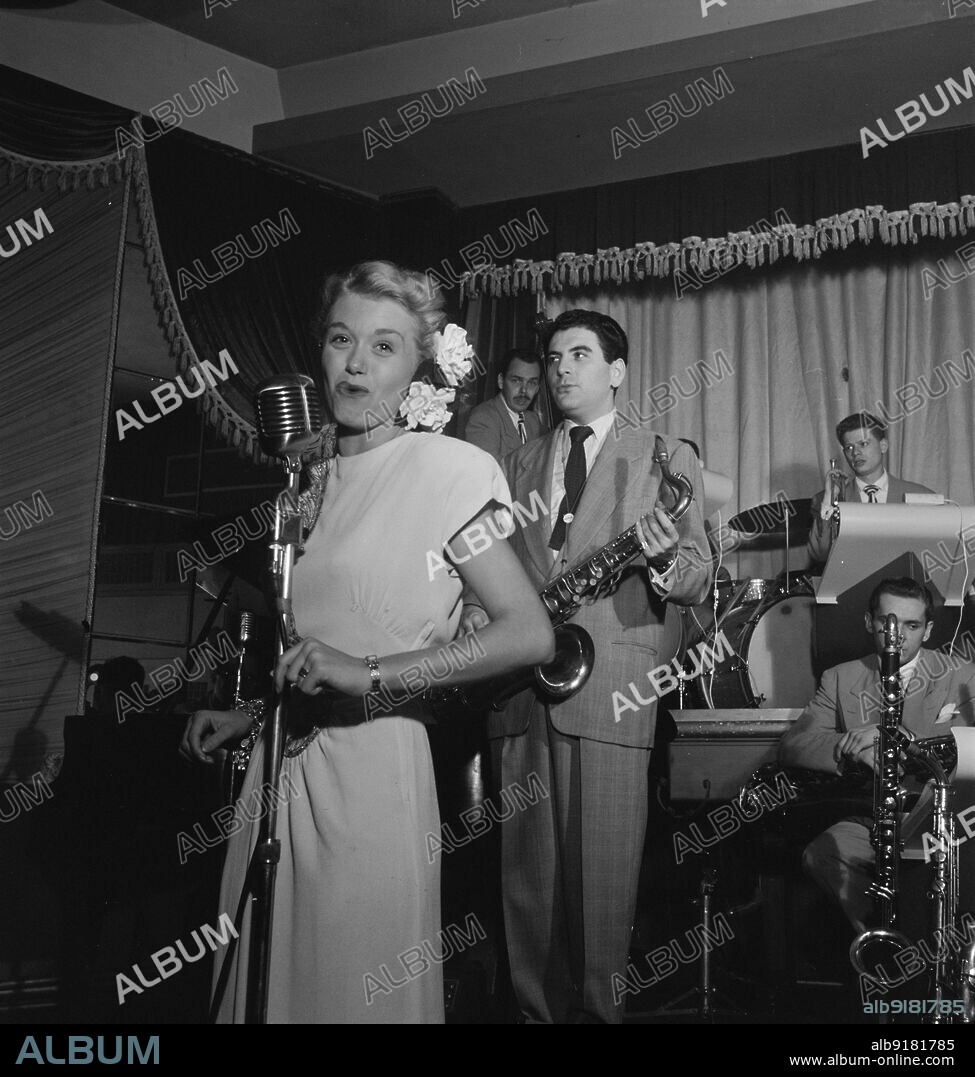 WILLIAM PAUL GOTTLIEB. Portrait of June Christy, Georgie Auld, and Red Rodney, Club Troubadour, New York, N.Y., ca. Sept. 1947.