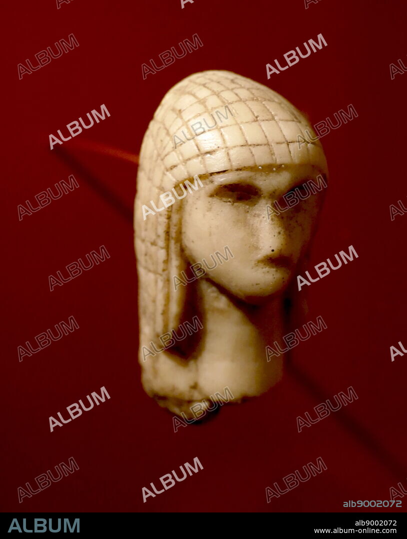 Photograph of the Venus of Brassempouy (la Dame de Brassempouy), a fragmentary ivory figurine from the Upper Palaeolithic. It was discovered in a cave at Brassempouy, France in 1892. About 25,000 years old, it is one of the earliest known representations of a human face. Dated 27,000 BC.
