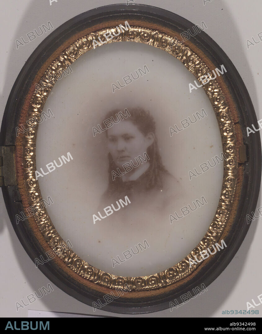 Portrait of a Young Woman, Ambrotype on milk glass, ca. 1860's, gold, oval, portrait, ringlets, woman.