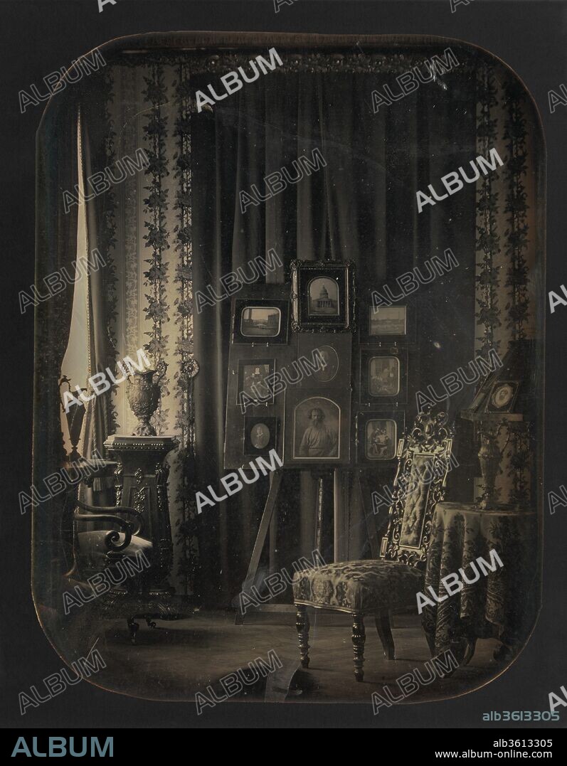 [The Salon of Baron Gros]. Artist: Baron Jean-Baptiste-Louis Gros (French, 1793-1870). Dimensions: Image: 22 x 17.1 cm (8 11/16 x 6 3/4 in.). Date: 1850-57.
Gros's exceptional mastery of the technical aspects of the daguerreotype was paired with a refined visual sensibility, seen here in the richness of the setting and the subtle and seductive play of light. Every detail is perfectly calibrated-the ewer carefully silhouetted in the window, the stylish high-back chair positioned invitingly in the glancing sunlight, the daguerreotypes on the easel clearly visible despite their mirrorlike surfaces, and the closed curtains providing a theatrical backdrop. It is an interior and a still life-but most of all it is a portrait of Baron Gros's social standing, aesthetic discernment, travels, and talent.