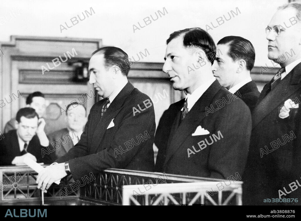 Buchalter, standing in court during sentencing, 1941. Louis Buchalter (February 6, 1897 - March 4, 1944) was an American mobster. In the early 1930s, he created an effective process for performing contract killings for Cosa Nostra mobsters; it had no name, but the press 10 years later called it Murder, Inc. In 1936, he was convicted of violating federal anti-trust laws. While out on bail he disappeared. In 1937, still a fugitive, he was indicted in federal court on conspiracy to smuggle heroin into the US. In 1939, he surrendered to FBI chief J. Edgar Hoover. After he was convicted on the federal narcotics trafficking charges, they turned him over to NY State for trial on labor extortion charges. In 1940, he was sentenced to 30 years to life, but was sent to Leavenworth Federal Penitentiary to serve his sentence of 14 years for narcotics trafficking. He was then was indicted on murder charges in for the killing of Joseph Rosen, a Brooklyn candy store owner. The jury found him guilty of first degree murder and he was sentenced to death. On March 4, 1944, Louis Buchalter, aged 47, was executed in the electric chair in Sing Sing. He had no final words. Photographed by Edward Lynch of the NY World-Telegram & Sun Newspaper, December 2, 1941.