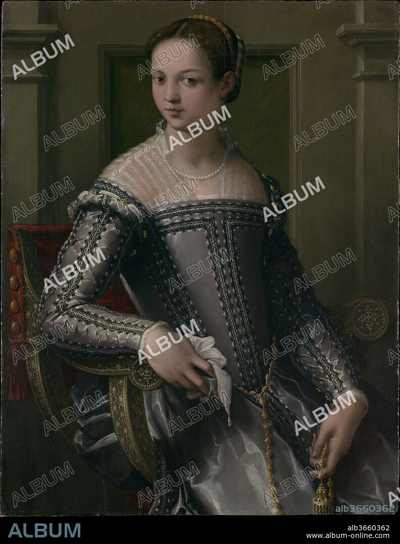 Portrait of a Woman. Artist: Italian (Florentine) Painter (mid-16th century). Dimensions: 38 1/2 x 30 in. (97.8 x 76.2 cm).
This elegant woman is depicted in an austere architectural setting typical of Florence in the mid-sixteenth century. Michele Tosini (1503-1577), who was active there during the decades when Bronzino was at his most influential, may have painted her. Tosini was also engaged in painting members of the court of Duke Cosimo I de' Medici.
