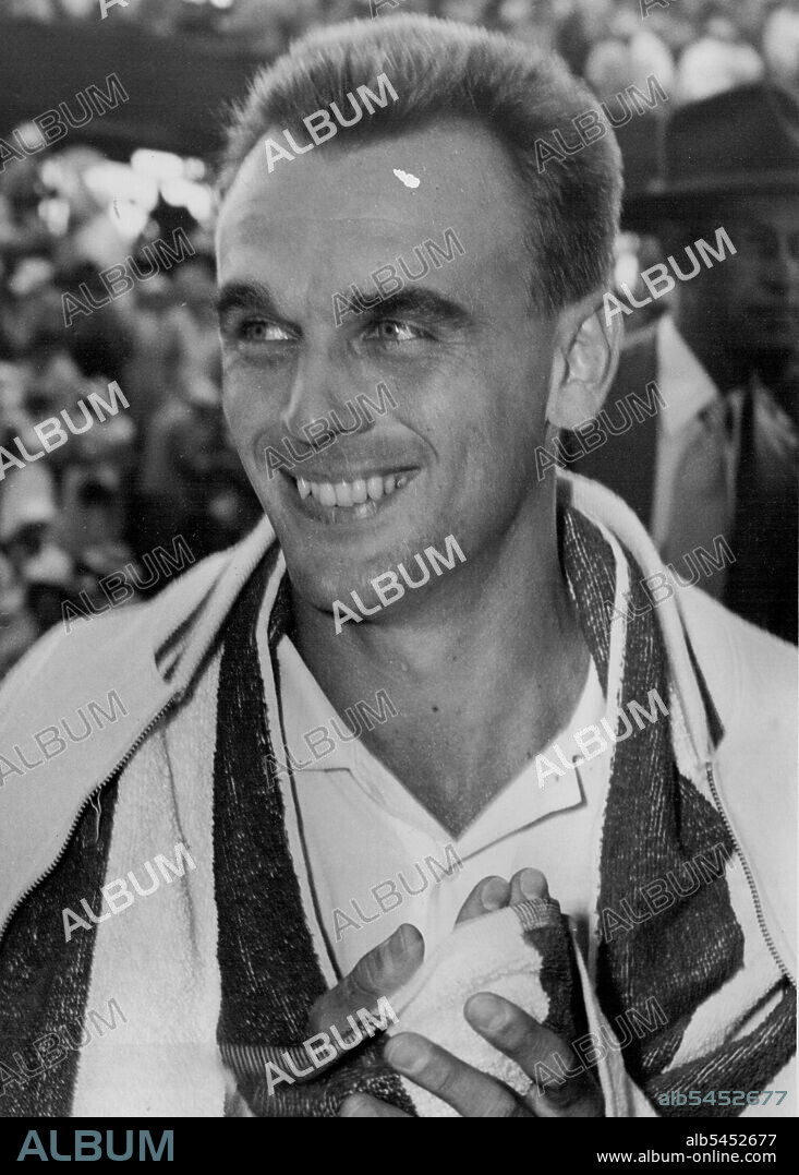 Vic Seixas (U.S.A.).Seixas grins happily after defeating Rosewall. December 29, 1954.