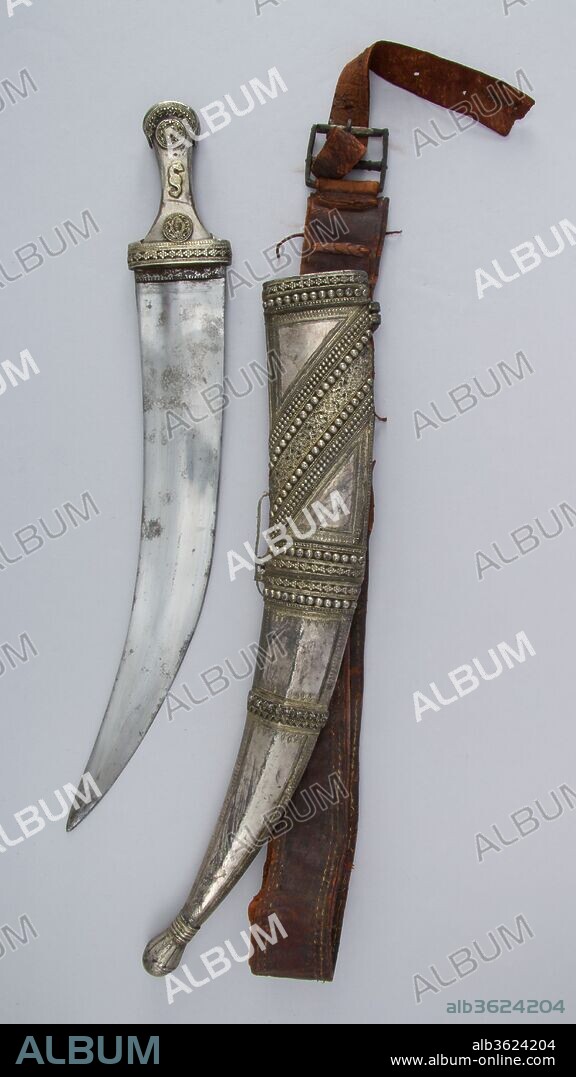 Dagger (Jambiya) with Sheath and Belt. Culture: Arabian. Dimensions: H. with sheath 20 5/8 in. (52.4 cm); H. without sheath 20 in. (50.8 cm); W. 2 1/2 in. (6.4 cm); Wt. 12.5 oz. (354.4 g); Wt. of sheath 1 lb. 6.6 oz. (640.7 g). Date: 19th century.