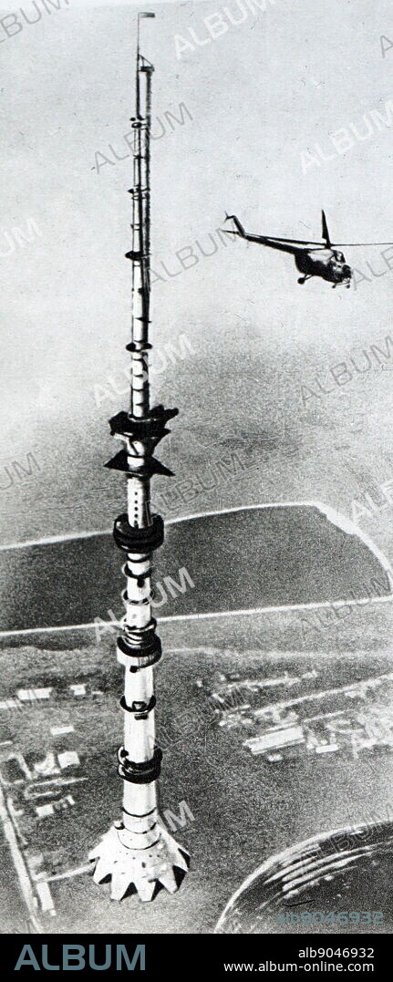 Construction stage of the Ostankino Tower, a television and radio tower in Moscow, Russia. Ostankino was designed by Nikolai Nikitin. It is currently the tallest free-standing structure in Europe and 11th tallest in the world. Between 1967 and 1974, it was the tallest in the world. The tower was the first free-standing structure to exceed 500 m (1,600 ft) in height. Construction began in 1963 and was completed in 1967.