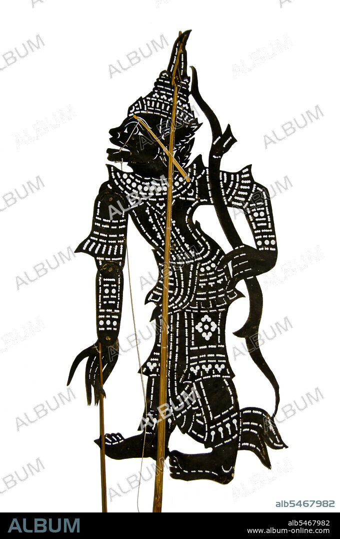 Nang talung' is the shadow puppet theatre popular in southern Thailand. It is an art form said to have originated as early as 400 BC in Southeast Asia. Performances usually last well into the night and remain an essential if diminishing part of village life in Thailand's Deep South. Nang means animal hide, from which the figures are cut. Talung refers to Phatthalung, a town in southern Thailand where the art form is said to have originated.  It is the task of a single skilled person, the 'nai nag' or puppet master, to create the whole show. Sitting behind an illuminated screen, he maneuvers up to six puppets per scene. The changing tone of the puppeteers voice differentiates between the characters, while a band of musicians adds tension to the story. While the more formal 'nang yai' is based on the Hindu epic the Ramayana known as the Ramakien in Thai 'nang talung' takes its inspiration from everyday life.