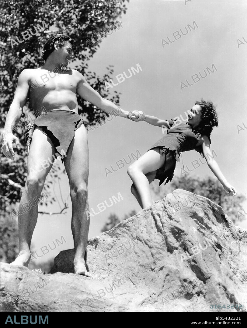 JOHNNY WEISSMULLER and MAUREEN O'SULLIVAN in TARZAN ESCAPES, 1936, directed by RICHARD THORPE. Copyright M.G.M.