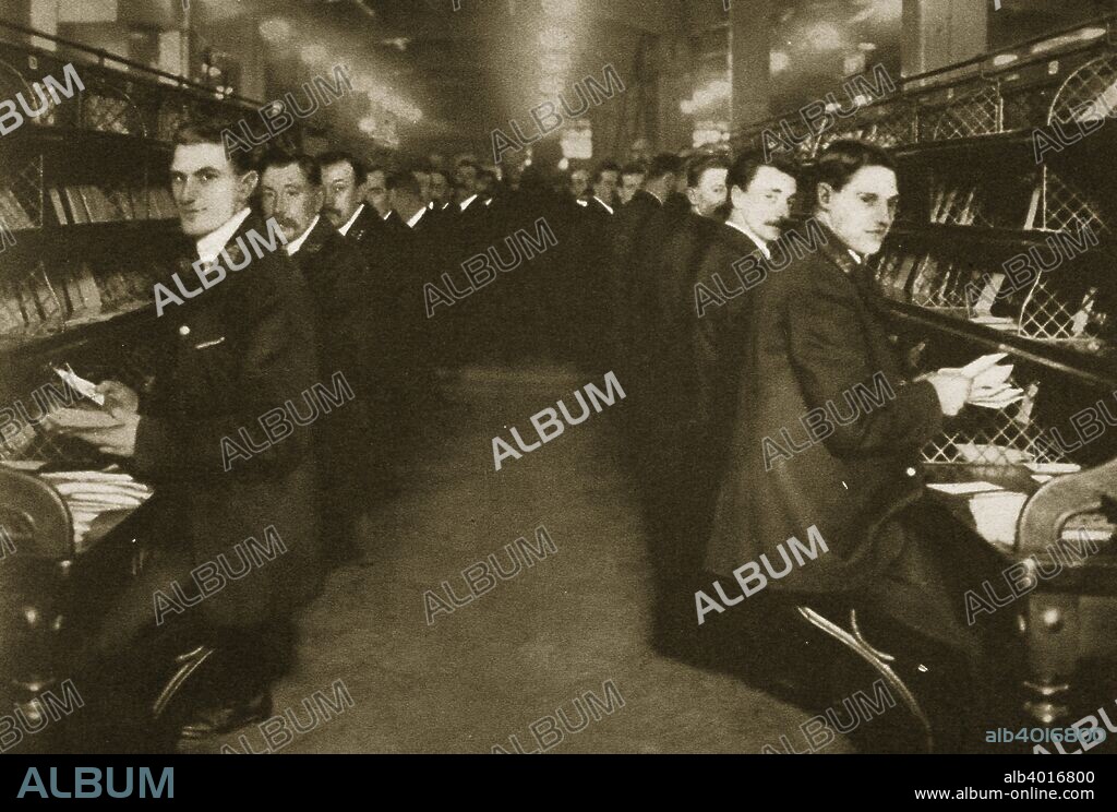 Staff sorting letters at the Post Office, Mount Pleasant, London, 20th century. The largest sorting office operated by the Royal Mail, Mount Pleasant Sorting Office in Clerkenwell opened in 1889.