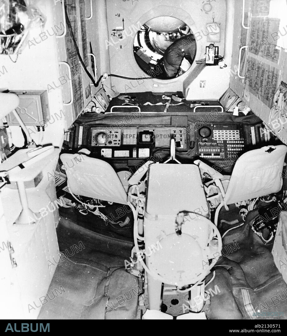 The interior of the salyut 1 space station with the hatchway leading to the soyuz 11 spacecraft, june 1971.
