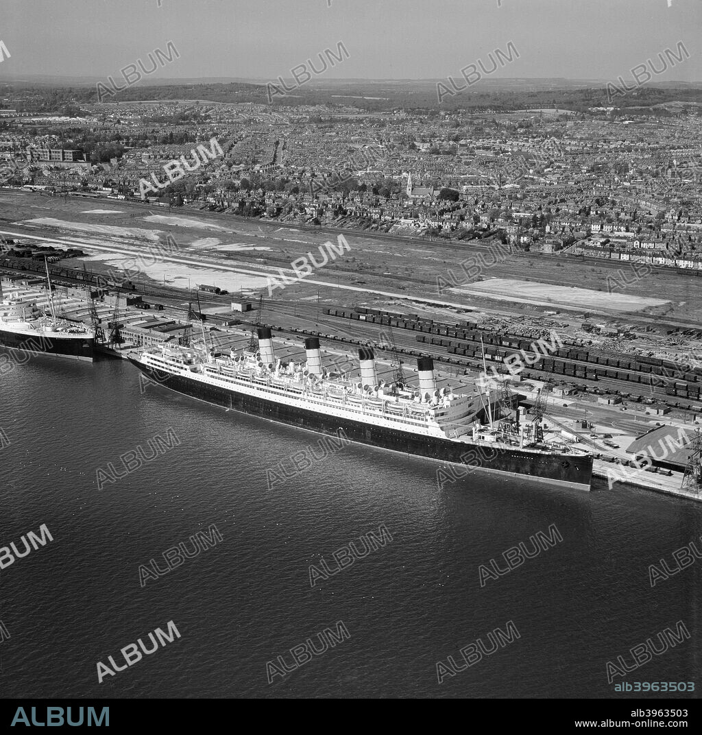 RMS 'Aquitania' at the New Docks (Western Docks), Southampton, Hampshire, 1949. A Cunard liner launched in 1913, 'Aquitania' was scrapped in 1950.