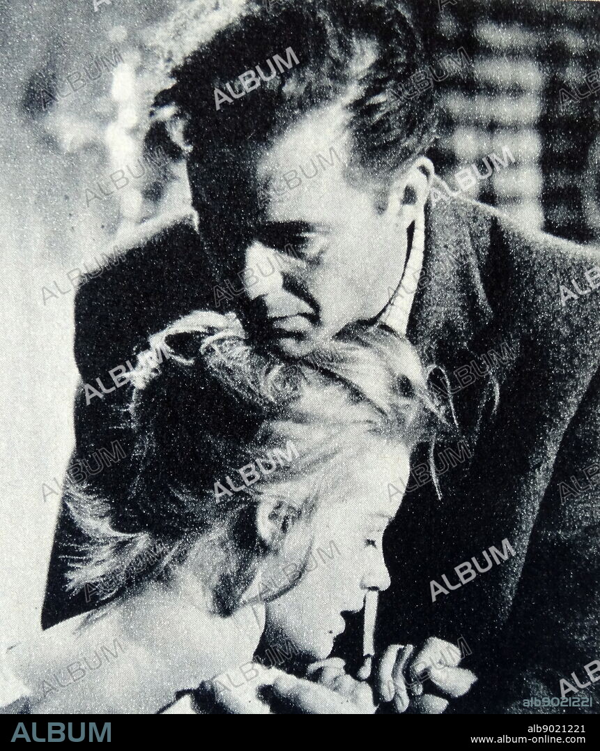 Newspaper review of the The Mind Benders, a 1963 British thriller film, photograph of Dirk Bogarde and Mary Ure.