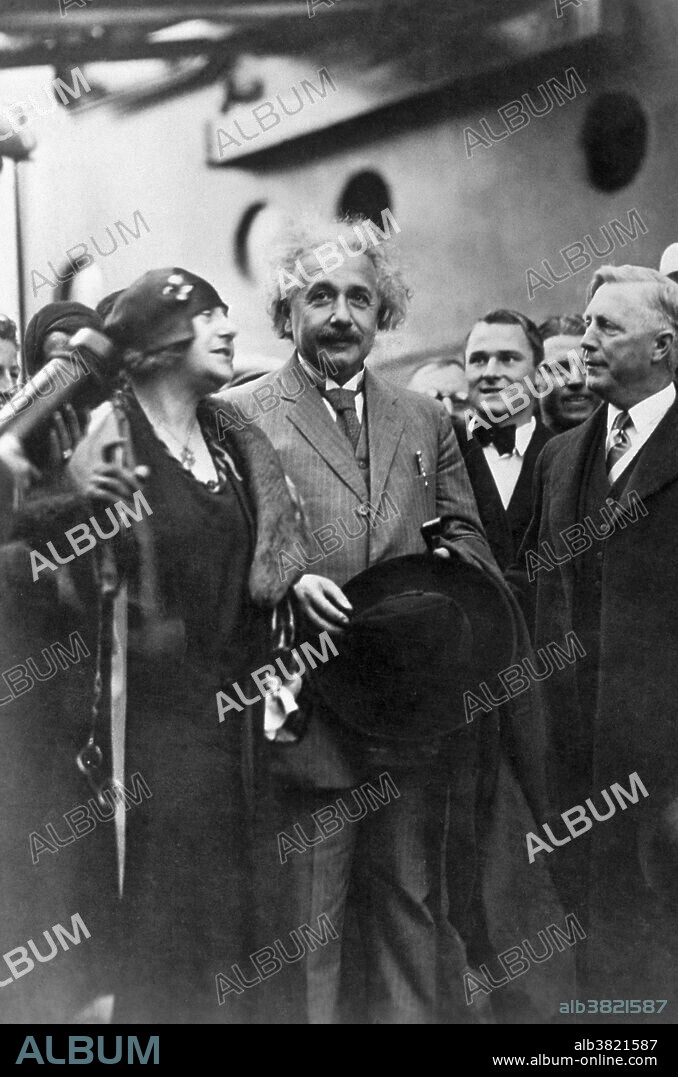 Einstein with his cousin and second wife Elsa Einstein Lowenthal arriving in San Diego, California, on New Year's Eve 1930. Albert Einstein (March 14, 1879 - April 18, 1955) was a German-born theoretical physicist. He developed the general theory of relativity, one of the two pillars of modern physics. He is best known in popular culture for his mass-energy equivalence formula E = mc2. He received the 1921 Nobel Prize in Physics "for his services to Theoretical Physics, and especially for his discovery of the law of the photoelectric effect". He was visiting the US when Hitler came to power in 1933, and did not go back to Germany. He settled in America becoming a citizen in 1940. He helped alert President Roosevelt that Germany might be developing an atomic weapon, and recommended that the US begin similar research. He was in support of defending the Allied forces, but largely denounced using the discovery of nuclear fission as a weapon. Later, together with Bertrand Russell, Einstein signed the Russell-Einstein Manifesto, which highlighted the danger of nuclear weapons. Einstein was affiliated with the Institute for Advanced Study in Princeton until his death in 1955, at the age of 76. His great intelligence and originality have made the word Einstein synonymous with genius.