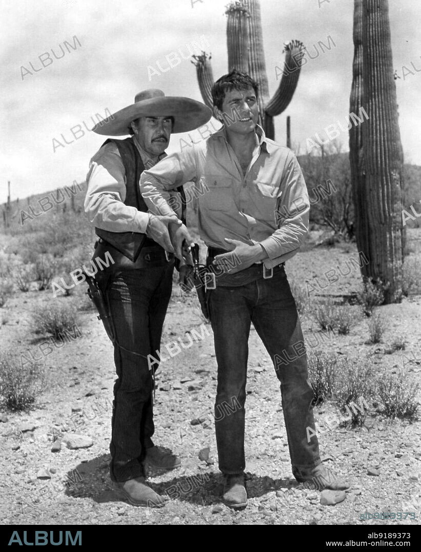 EMILIO FERNANDEZ and NINO CASTELNUOVO in THE REWARD, 1965, directed by SERGE BOURGUIGNON. Copyright 20TH CENTURY FOX.
