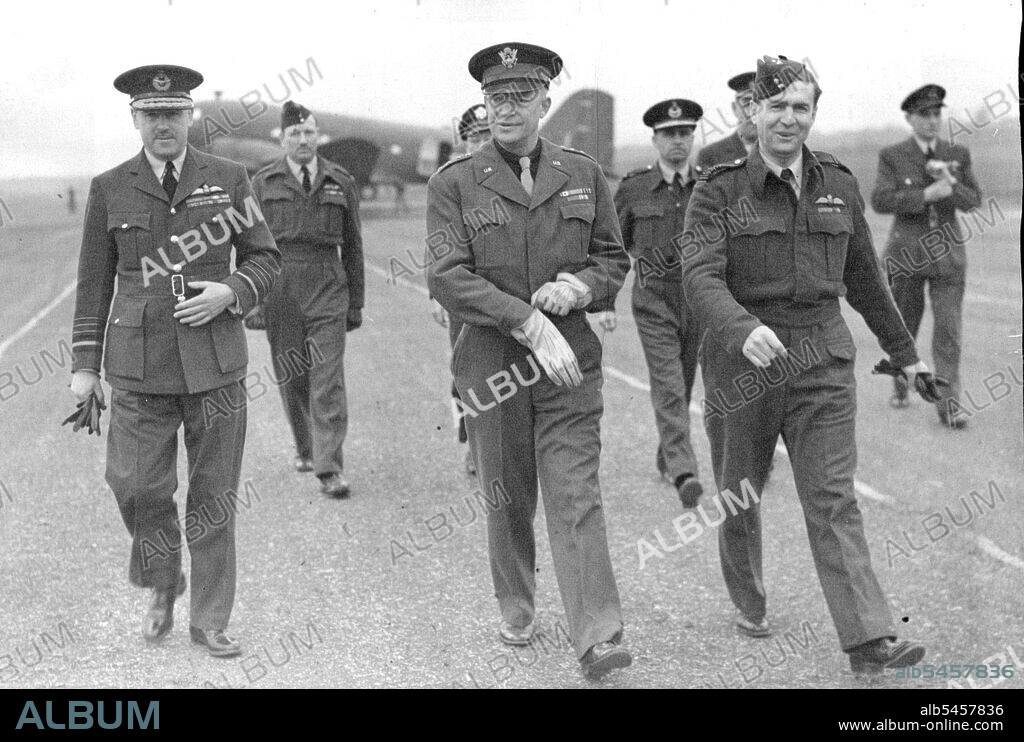 General Eisenhower Inspects R.A.F. Bomber Wing.Air Chief Marshal Sir Trafford Leight-Mallory (left), general Eisenhower (centre) and group Captain Dunlap (right).General Eisenhower, Supreme allied Commander of British and U.S. expeditionary forces, inspected an R.A.F. medium bomber wing. He was accompanied on his tour of inspection by Air Chief Marshal Sir Trafford L. Leight-Mallory, K.C.B., D.S.O, Air Commander in Chief, allied expeditionary Air Force, Air Marshal Sir Arthur coningham, K.C.B., D.S.O., M.C., A.F.C.,Air Officer commanding 2nd tactical Air Force and General L.H. Brereton, commanding General 9th A.A.F. April 20, 1944. (Photo by Photographic News Agencies Ltd.).
