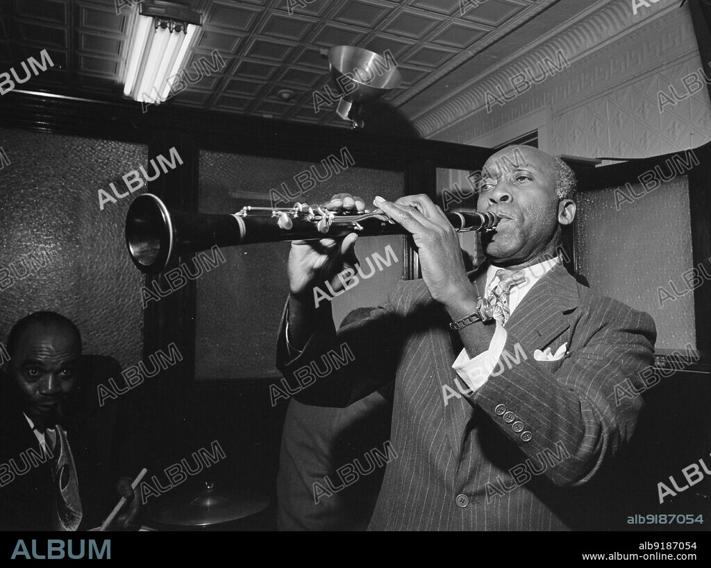 WILLIAM PAUL GOTTLIEB. Portrait of Fess Williams and Freddie Moore, William P. Gottlieb's office party, Jamaica, Queens, New York, N.Y., ca. 1948.