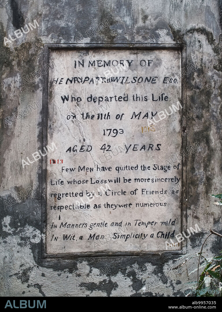 India: Plaque on the 18th century grave of one Henry Patrick Wilsone in South Park Street Cemetery, a colonial-era graveyard in Kolkata (Calcutta). The cemetery, formerly known as the ÄòGreat Christian Burial GroundÄô, was one of the earliest non-church cemeteries in the world and houses graves and monuments belonging to British soldiers, administrators, and their families.