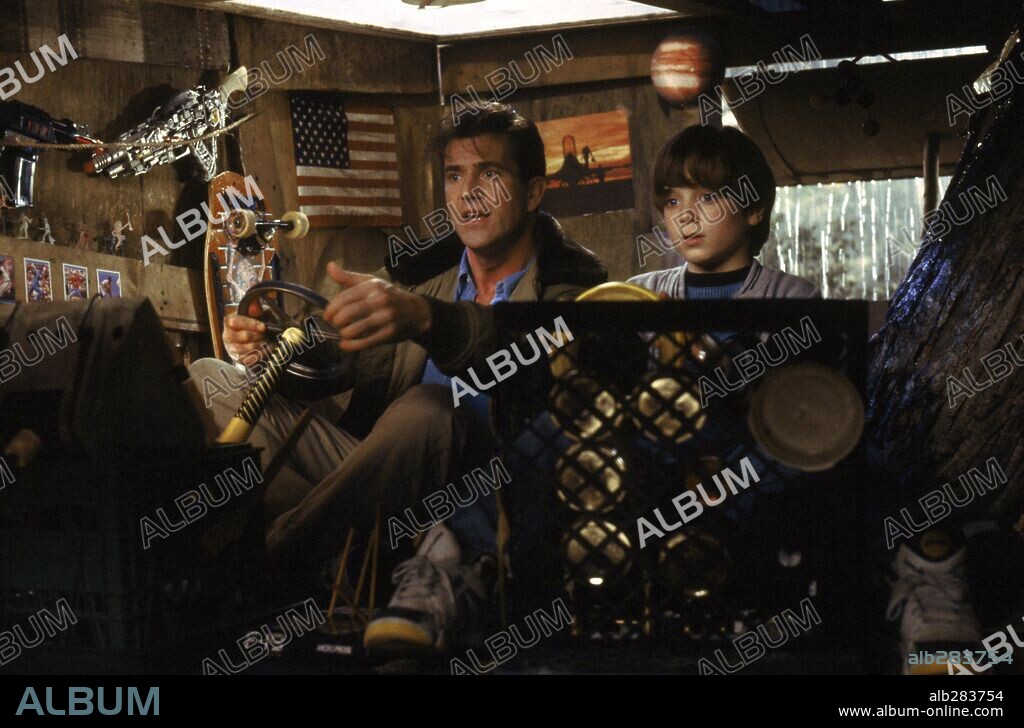 ELIJAH WOOD and MEL GIBSON in FOREVER YOUNG, 1992, directed by STEVE MINER. Copyright WARNER BROTHERS.