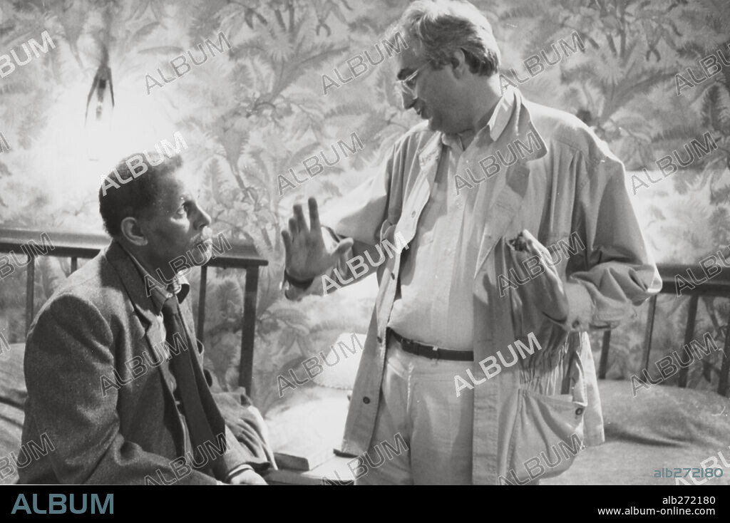BERTRAND TAVERNIER and DEXTER GORDON in ROUND MIDNIGHT, 1986, directed by BERTRAND TAVERNIER. Copyright WARNER BROTHERS.