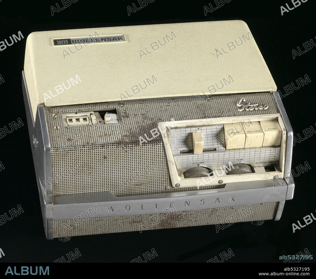 African-American Muslim minister and civil rights activist Malcolm X (born Malcolm Little, 1925-1965) gave speeches at Mosque No. 7, (later renamed Masjid Malcolm Shabazz) in Harlem, New York. Wollensak Stereo-tape magnetic recorder, Model T-1515. Beige plastic with silver metal. The front of the recorder has several beige buttons to play, record and stop as well as volume and tone controls. There is a counter to track the time of the recording to the left of the buttons. The lid of the recorder lifts off so that tape reels can be placed inside for recording. The lid of the recorder has the words [3M WOLLENSAK]. The handle on the side of the recorder also includes the word [WOLLENSAK].