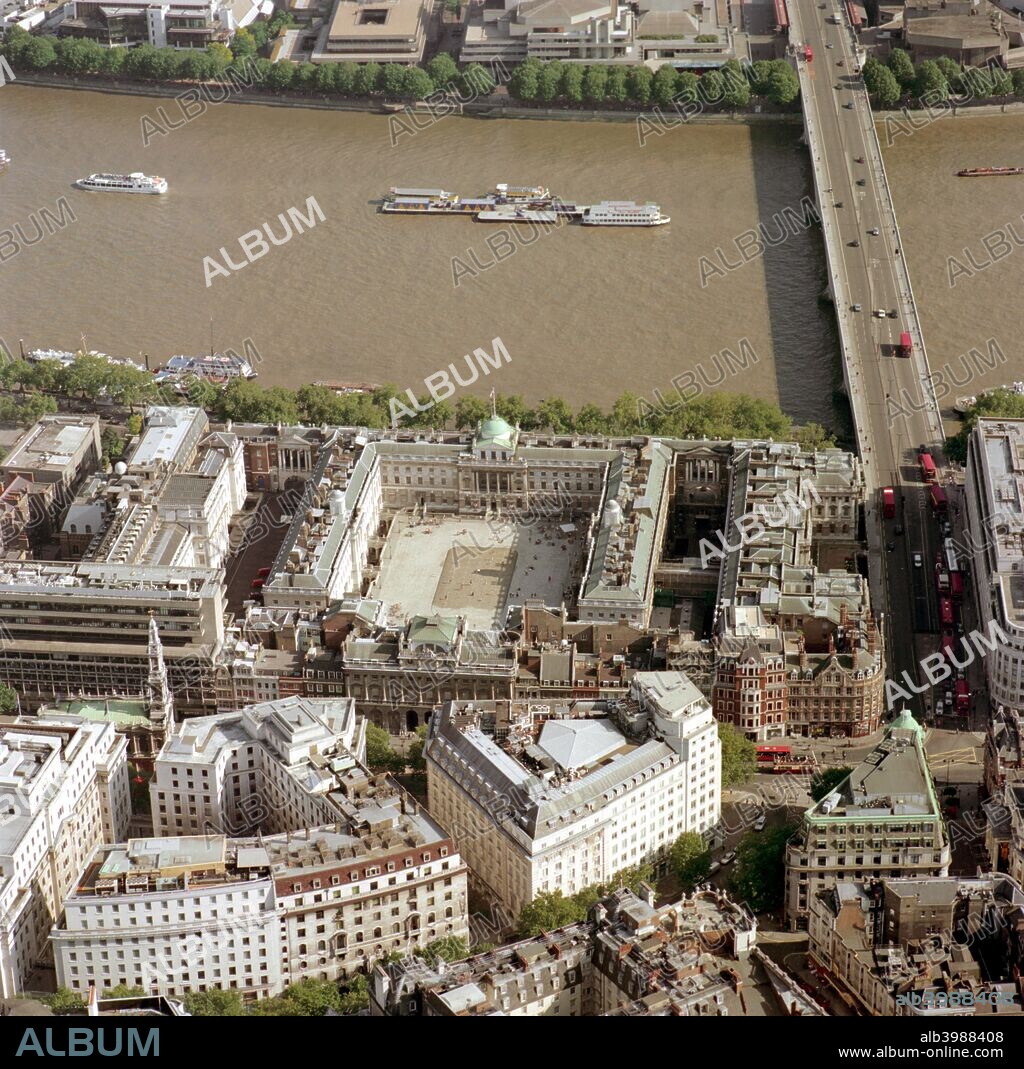 Somerset House and Waterloo Bridge, Westminster, London, 2002. The first bridge on this site was opened 18 June 1817, the 2nd anniversary of the Battle of Waterloo. This was replaced with the present one 1937-42. The oldest part of Somerset House was built 1547-50 and was redesigned by 1609 and 1627, some of which was under the supervision of Inigo Jones. This was added to in the 1770s with the area nearest to the water, which reached the south terrace at the time.