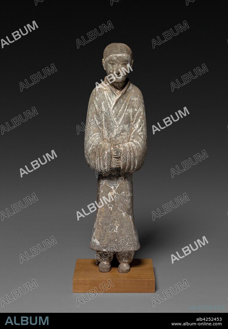 Female Attendant (Tomb Figurine), c. 2nd Century BC. China, probably Shensi province, Western Han dynasty (202 BC-AD 9). Gray earthenware with slip coating and traces of polychromy; overall: 54.9 cm (21 5/8 in.).