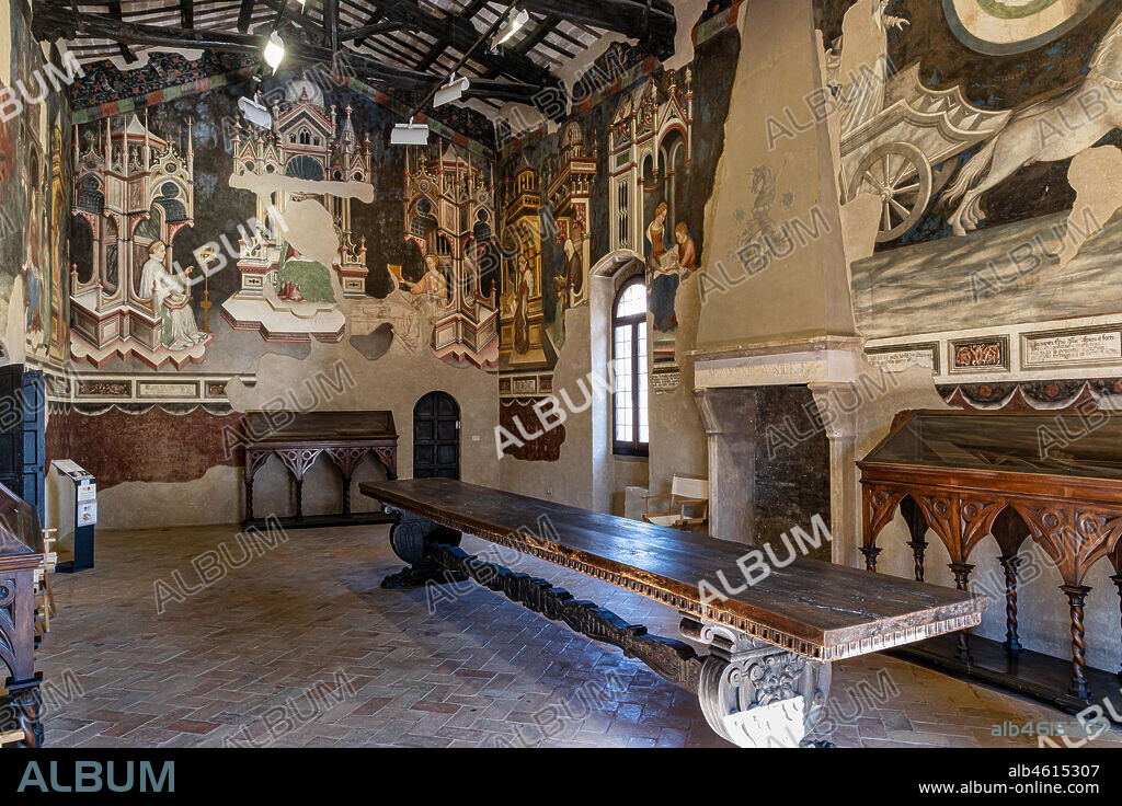 Foligno, Trinci Palace: The Hall of Liberal Arts and Planets. In this hall the symbolic figures of the seven planets are represented (Moon, Mars, Mercury, Jupiter, Venus, Saturn, Sun) following the order of the days of the week. Each planet oversees a phase of human life that is depicted inside concentric disks where in the middle zone, the Air, the Sun and the Moon define a specific time of day. On the north wall of the Hall the Arts of Trivio (Grammar. Dialectic, Rhetoric) and of the Quadrivium (Arithmetic, Music, Geometry and Astronomy) were depicted, according to a hierarchical order of learning that leads to the point of arrival of all human knowledge, Philosophy , which triumphs in the center of the wall opposite the window. Each planet influences a phase of human life, at each stage of human life corresponds, in the learning scale, a different discipline, each discipline is similar, for its properties, to one of the celestial spheres. The decoration is entrusted to Gentile da Fabriano, the greatest exponent of international Gothic in Italy, with aids (Jacopo Bellini, Paolo Nocchi, Francesco Giambono from Bologna and Domenico da Padova's Battista), and realized the 1411 and 1412 trails.