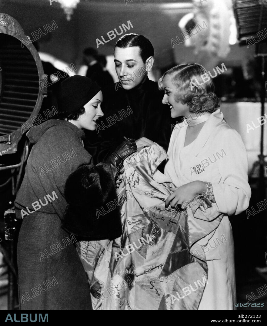 CAROLE LOMBARD, GEORGE RAFT and GLORIA SWANSON in BOLERO, 1934, directed by MITCHELL LEISEN and WESLEY RUGGLES. Copyright PARAMOUNT PICTURES. Visita en el set de 'Bolero'.