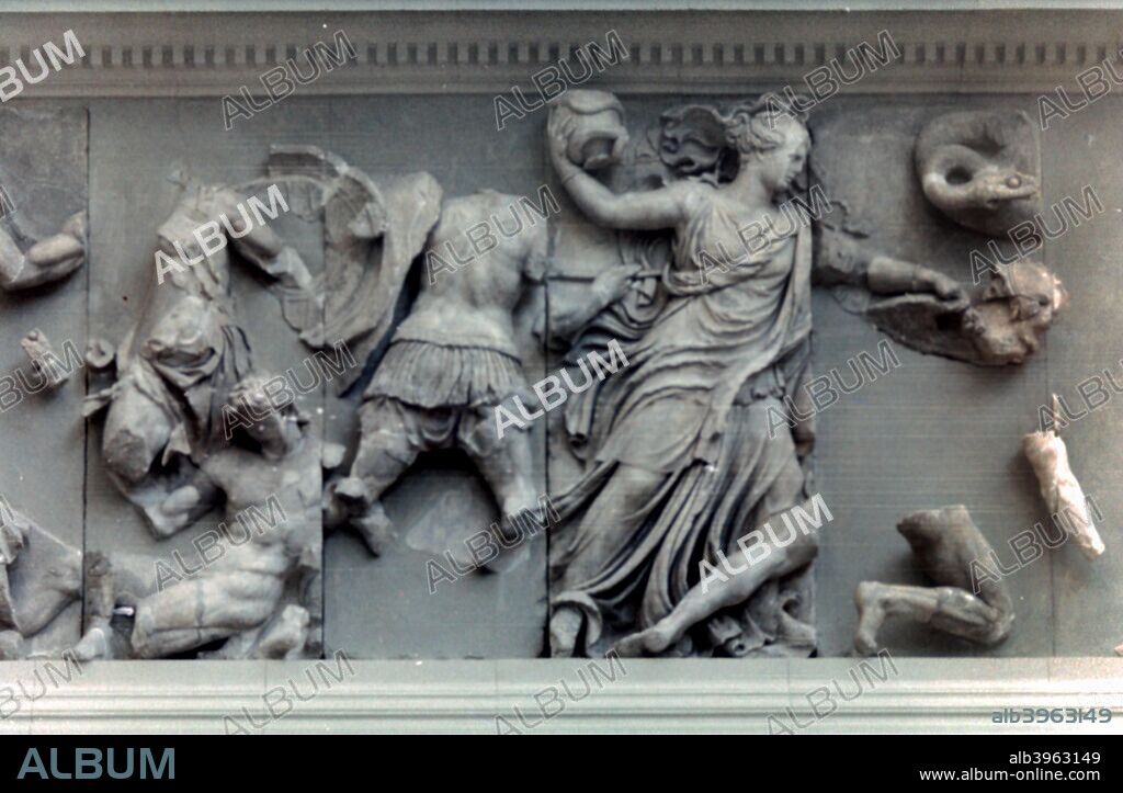 Detail from the Great Frieze of the Pergamon Altar, 180-159 BC. The 113 metre long Ancient Greek frieze depicts the 'gigantomachy', the struggle between the gods and the giants. From the Pergamon Museum, Berlin, Germany.