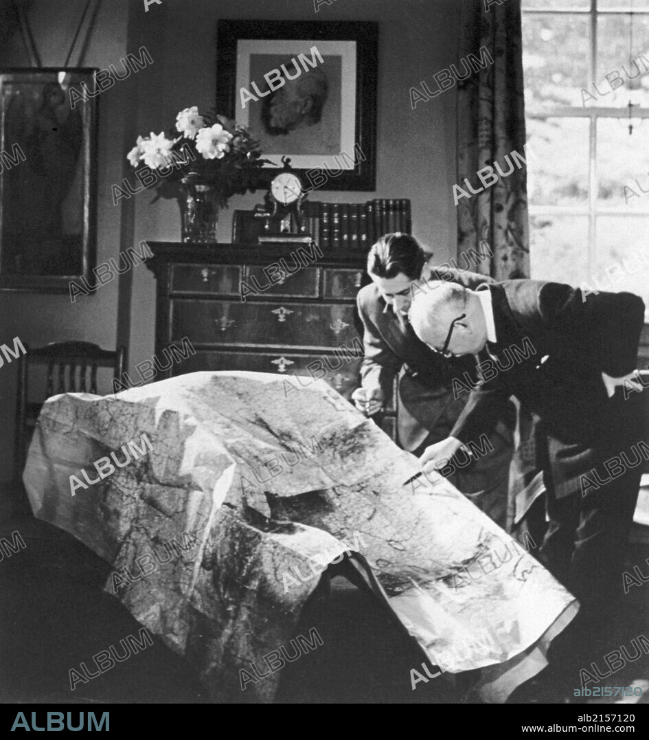 Czechoslovak President Edvard Benes (1884-1948,Right) And His Assistant Eduard Taborsky Checking The Map For Latest War Development In Benes'S London Office In Exile During The Wwii. May 28Th 2004 Marked Benes'S 120Th Birth Anniversary.  (Photo by: Sovfoto/UIG via Getty Images).