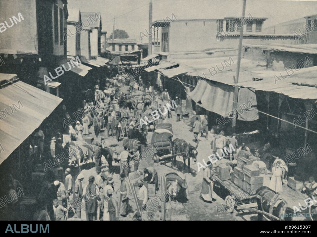 CHARLES H GABRIEL. 'Chaffering Oriental Crowds That Throng The Street Markets', c1935. A market in Damascus, Syria. From Our Wonderful World, Volume IV, edited by J.A. Hammerton. [The Amalgamated Press, Ltd., London].