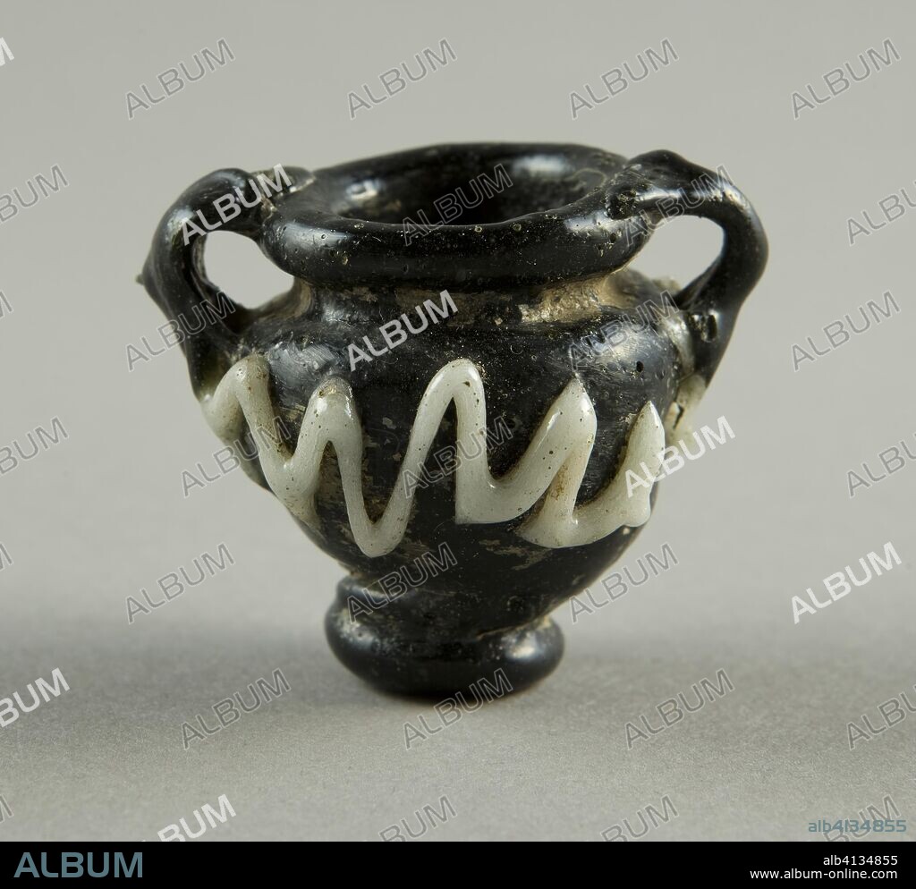 Jar. Byzantine. Date: 400 AD-600 AD. Dimensions: H. 4.1 cm (1 5/8 in.); diam. 5.1 cm (2 in.). Glass, blown technique. Origin: Syria.