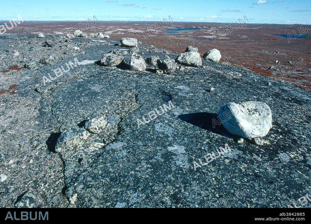 Canadian Shield rocks in the Barrenlands of the Northwest Territories, Canada, north of Yellowknife. This formation was deposited 2.5 billion years ago in Pre-Cambrian seas.