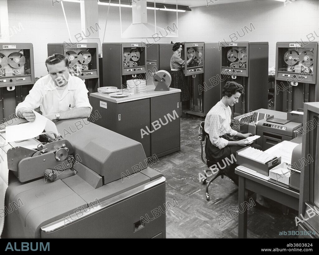 In April 1955 the first of four IBM 704s arrived at Lawrence Livermore National Laboratory. The IBM 704, the first mass-produced computer with floating-point arithmetic hardware, was introduced by IBM in 1954. The IBM 704 Manual of operation states: The type 704 Electronic Data-Processing Machine is a large-scale, high-speed electronic calculator controlled by an internally stored program of the single address type. The 704 was thus regarded as "pretty much the only computer that could handle complex math." The 704 was a significant improvement over the earlier IBM 701 in terms of architecture and implementation. Like the 701, the 704 used vacuum tube logic circuitry. Changes from the 701 included the use of core memory instead of Williams tubes and the addition of three index registers. To support these new features, the instructions were expanded to use the full 36-bit word.  The 704 could execute up to 12,000 floating-point additions per second. IBM sold 140 type 704 systems between 1955 and 1960. No photographer credited, circa 1950s.