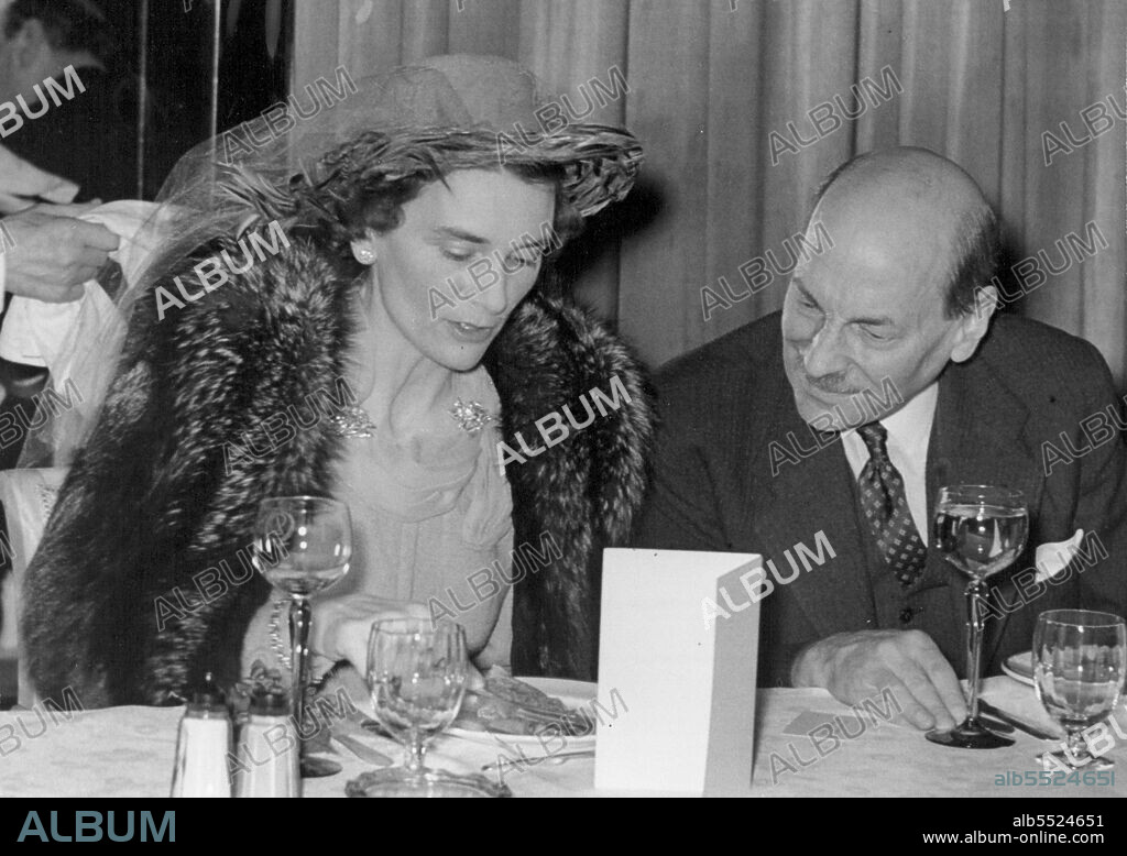 Australia Club Luncheon At The Dorchester Hotel: Duchess of Gloucester chatting with Britain's Prime Minister, Hon, Clement Attlee at the Australia Club Luncheon at the Dorchester Hotel London. May 08, 1947.